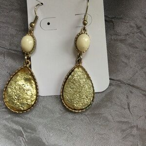 Elegant Gold and Cream Earrings with Textured Teardrop